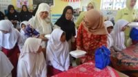 Peringati Hari Ibu ke-69, BKOW Provinsi Jambi Gelar Bhakti Sosial
