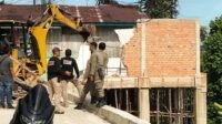 Bangunan Terlarang di Tikungan Bukit Tiung Bangko Dibongkar