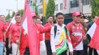 Kibar Bendera Merah Putih Ribuan di Jembatan Gentala Arasy, Gubernur Al Haris Raih Rekor MURI