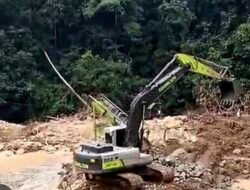 Oknum PPPK “Main”Tambang Emas Ilegal Menggunakan Alat Berat